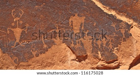 Pre-Columbian Rock Art Panel from the \'Golf Course\' rock art site near Moab, Utah, including the iconic \'Moab Man\' at left
