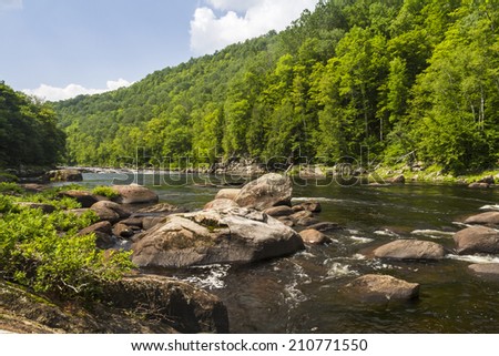The Hudson River as it flows through the the Hudson Gorge in the Adirondacks Mountains of upstate New York