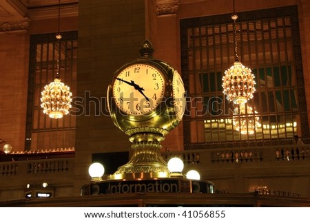 Clock over the information booth in the middle of the great hall in Grand Central Terminal - New York