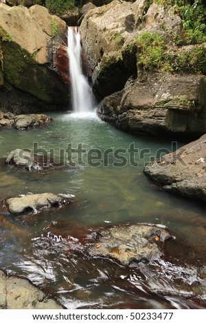 Falls and pool below La Mina Falls in the El Yunque rainforest in the Caribbean National Forest, Puerto Rico