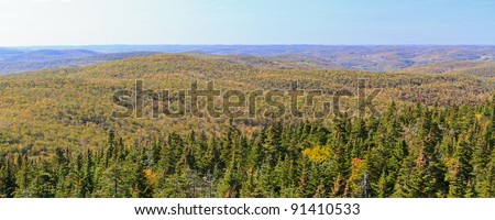 A panoramic view to the west from Balsam Lake Mountain fire tower in early autumn in the Catskills Mountains of New York