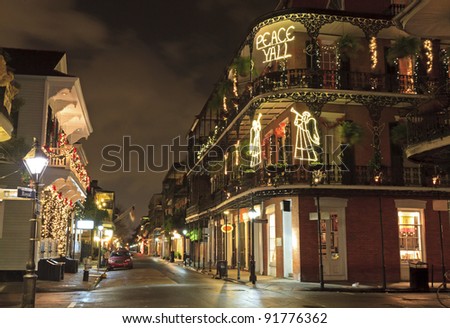Christmas Lights on the corner of Royal and Dumaine Streets spell out a very Southern greeting in the French Quarter of New Orleans