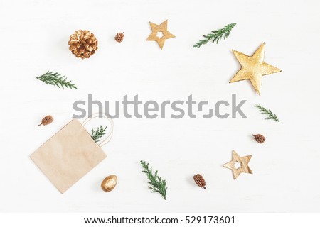 Christmas composition. Gift, christmas decoration, cypress branches, pine cones. Flat lay, top view