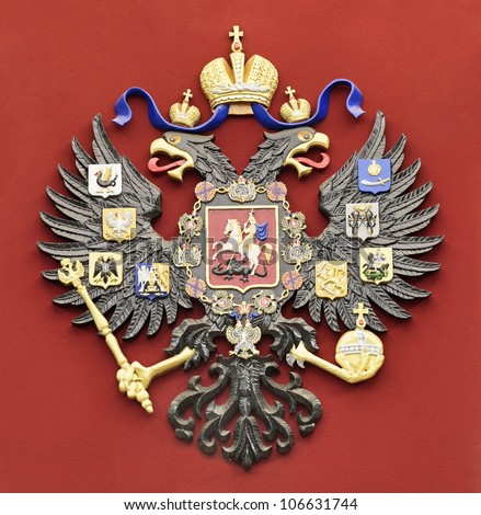 Coat of arms of the Russian Federation on a red background