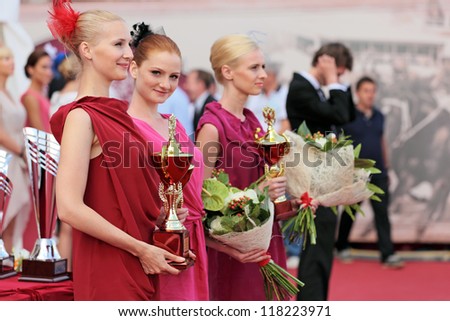 MOSCOW, RUSSIA - JUL 07: The races for the prize of the President of the Russian Federation on Jul 07, 2012 in Moscow. Girls fashion models at the ceremony of awarding the winners