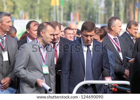 NIZHNY TAGIL, RUSSIA- AUG 22: Governor of Sverdlovsk region Evgeny Kuyvashev and Director Ural Works of Civil Aviation Vadim Badekha at RUSSIAN DEFENCE EXPO 2012 on August, 22, 2012 at N.Tagil, Russia
