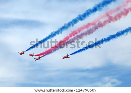 ZHUKOVSKY, RUSSIA - AUG 11: The aerobatic team Red Arrows Royal Air Force of United Kingdom on celebrating of the 100 anniversary of Russian air force. August, 11, 2012 at Zhukovsky, Russia.