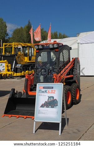 NIZHNY TAGIL, RUSSIA- AUG 22: Compact loader with Dozer equipment at the exhibition RUSSIAN DEFENCE EXPO 2012 on August, 22, 2012 at Nizhny Tagil, Russia