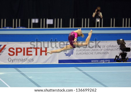 MOSCOW - APR 21: 2013 European Artistic Gymnastics Championships. Anastasia Grishina -?? bronze medalist on the Balance beam and All-Around in Olympic Stadium on April 21, 2013 in Moscow, Russia.