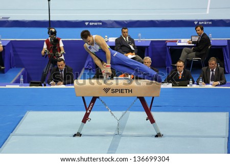 Moscow - Apr 20: 2013 European Artistic Gymnastics Championships. Saso Bertonceljl - Slovenian Artistic Gymnast Acts On The Balance Beam In Olympic Stadium On April 20, 2013 In Moscow, Russia.