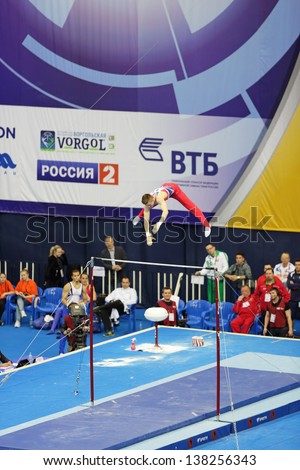 MOSCOW-APR 21: 2013 European Artistic Gymnastics Championships.  Sam Oldham - British artistic gymnast, silver medalist acts on the Horizontal Bar in Olympic Stadium on APR 21, 2013 in Moscow, Russia