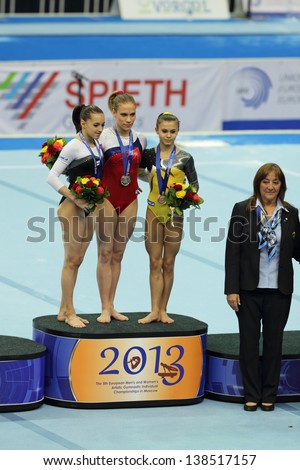 MOSCOW - APR 21: 2013 European Artistic Gymnastics Championships. Awarding of winners - Ksenia Afanasyeva, Larisa Iordache and Diana Bulimar in Olympic Stadium on April 21, 2013 in Moscow, Russia