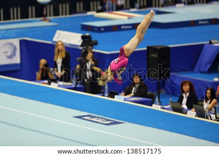MOSCOW - APR 21: 2013 European Artistic Gymnastics Championships. Anastasia Grishina (Russia) performs Floor Exercise in Olympic Stadium on April 21, 2013 in Moscow, Russia.