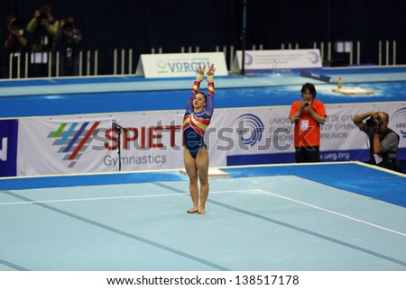MOSCOW - APR 21: 2013 European Artistic Gymnastics Championships. Roxana Popa Nedelcu - Spanish artistic gymnast, performs Floor Exercise in Olympic Stadium on April 21, 2013 in Moscow, Russia
