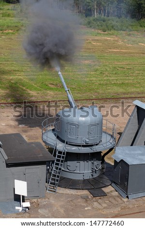 The firing of the ship cannon at the landfill, testing of marine guns