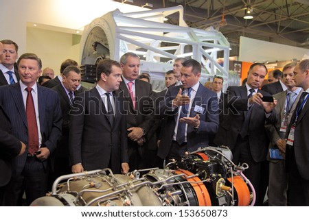 ZHUKOVSKY, RUSSIA - AUG 27: Government delegation headed by Dmitry Medvedev at the International Aviation and Space salon MAKS. Aug, 27, 2013 at Zhukovsky, Russia