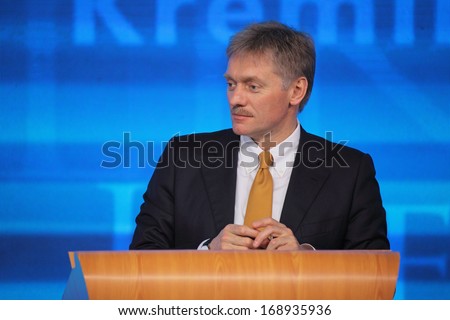 MOSCOW, RUSSIA - DEC 19, 2013: The Dmitry Peskov - Press Attache for the President of Russia Vladimir Putin, Deputy head of the Presidential at annual press conference in Center of international trade