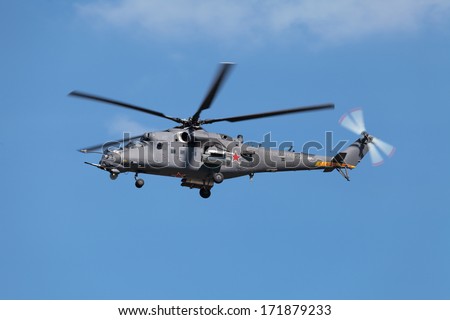 ZHUKOVSKY, RUSSIA - AUG 28, 2013: Demonstration flight Mil Mi-35 - a Russian large helicopter gunship and attack helicopter at the International Aviation and Space salon MAKS-2013