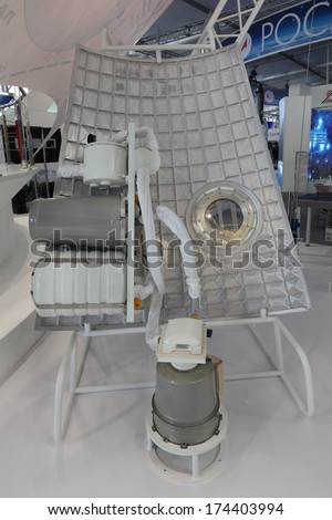 ZHUKOVSKY, RUSSIA - AUG 29: Stand of Korolev Rocket and Space Corporation Energia. Component of spacecraft - a piece of shell of the spaceship at the International Aviation and Space salon MAKS-2013