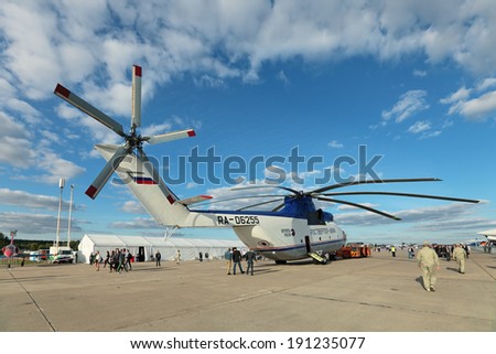 ZHUKOVSKY, RUSSIA - AUG 27, 2013: Towing russian heavy transport helicopter Mi-26 \