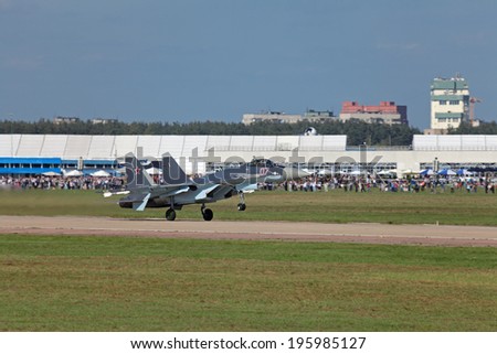 ZHUKOVSKY, RUSSIA - AUG 28, 2013: Demonstration flight Sukhoi Su-35 is single-seat, twin-engine supermaneuverable multirole fighters at the International Aviation and Space salon MAKS-2013