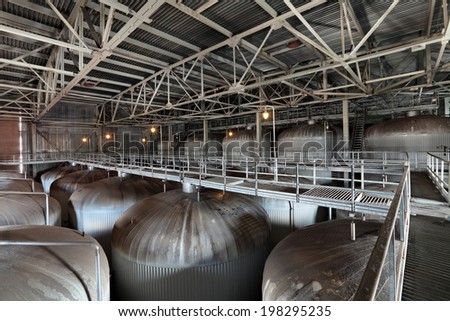 Brewing production - fermentation department, the upper part of the fermentation vats, the interior of the brewery, nobody