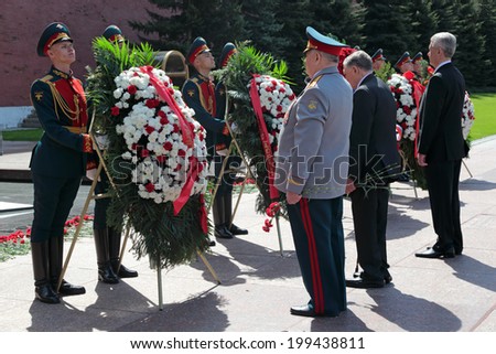 MOSCOW, RUSSIA - MAY 8, 2014: A wreaths and red carnations assigned to the monument Tomb of the Unknown Soldier in Alexander Garden. Festive events dedicated to the 69th Anniversary of Victory Day