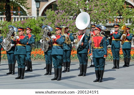 MOSCOW, RUSSIA - MAY 8, 2013: Kremlin brass band at the ceremony laying flowers to the Tomb of the Unknown Soldier in Alexander Garden. Festive events dedicated to the 69th Anniversary of Victory Day