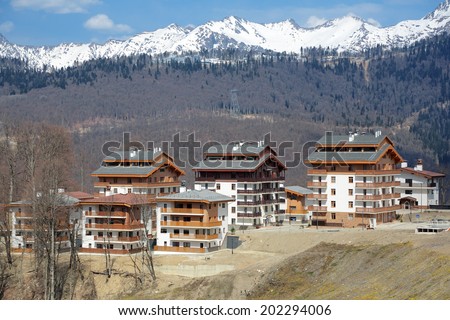 SOCHI, ADLER DISTRICT, KRASNODAR KRAI, RUSSIA - MAR 14, 2014: Mountain Olympic village at Rosa Khutor, Krasnaya Polyana - the place of residence of the athletes of the winter Olympic games 2014
