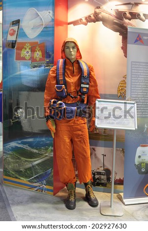 NIZHNY TAGIL, RUSSIA - SEP 25, 2013: The international exhibition of armament, military equipment and ammunition RUSSIA ARMS EXPO (RAE-2013). Fire-protective clothing volunteer