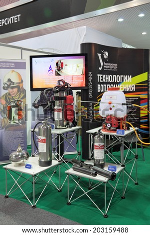 NIZHNY TAGIL, RUSSIA - SEP 25, 2013: The international exhibition of armament, military equipment and ammunition RUSSIA ARMS EXPO (RAE-2013). Portable fire-extinguishing systems