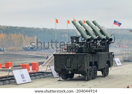 NIZHNY TAGIL, RUSSIA - SEP 25, 2013: Buk missile system (air defense complex) at the international exhibition of armament, military equipment and ammunition RUSSIA ARMS EXPO (RAE-2013)