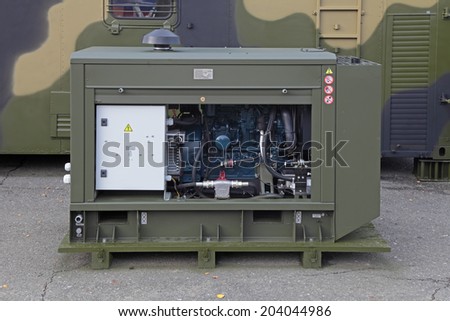NIZHNY TAGIL, RUSSIA - SEP 26, 2013: The international exhibition of armament, military equipment and ammunition RUSSIA ARMS EXPO (RAE-2013). Diesel generator set