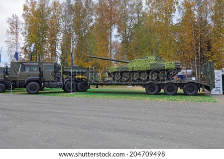 NIZHNY TAGIL, RUSSIA - SEP 25, 2013: The exhibition RUSSIA ARMS EXPO (RAE-2013). Semi-heavy-duty vehicle automobile for transportation of armored vehicles