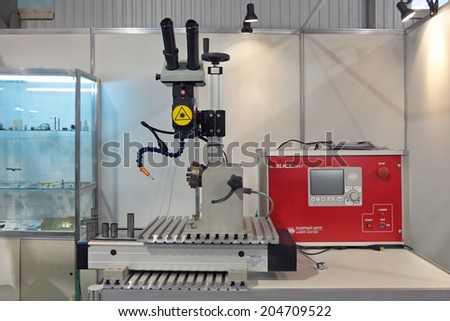 NIZHNY TAGIL, RUSSIA - SEP 26, 2013: The international exhibition of armament, military equipment and ammunition RUSSIA ARMS EXPO (RAE-2013). The machine tool for metal processing laser