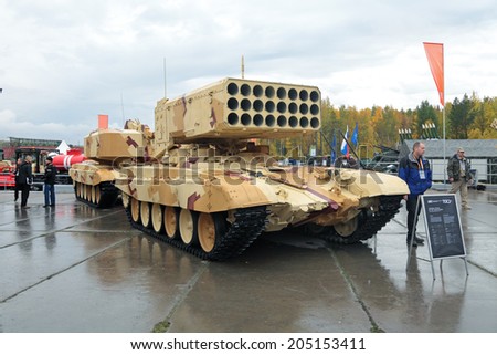 NIZHNY TAGIL, RUSSIA - SEP 26, 2013: The international exhibition of armament, military equipment and ammunition RUSSIA ARMS EXPO. Russian Heavy Flame Thrower System, multiple rocket launcher TOS-1