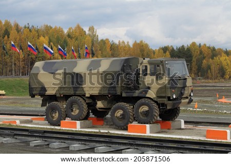 NIZHNY TAGIL, RUSSIA - SEP 26, 2013: The exhibition RUSSIA ARMS EXPO (RAE-2013). The Ural-5323 is a 8x8 heavy-duty off-road truck specially designed for army service