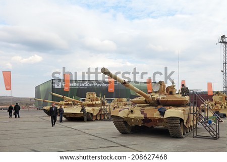 NIZHNY TAGIL, RUSSIA - SEP 26, 2013: The international exhibition of armament, military equipment and ammunition RUSSIA ARMS EXPO (RAE-2013). The T-90 Russian third-generation main battle tank
