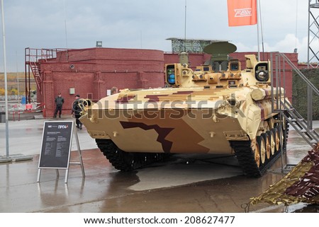 NIZHNY TAGIL, RUSSIA-SEP 26, 2013: The international exhibition of armament, military equipment and ammunition RUSSIA ARMS EXPO (RAE-2013). Military armoured vehicle - mobile reconnaissance post PRP4A