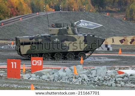 NIZHNY TAGIL, RUSSIA - SEP 26, 2013: The international exhibition of armament, military equipment and ammunition RUSSIA ARMS EXPO (RAE-2013). The arborne fighting vehicle BMD-4M