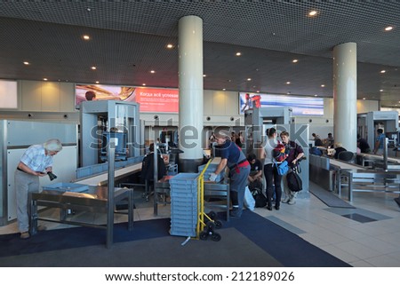 MOSCOW, RUSSIA - AUG 04,2014: Increased security measures. Screening of passengers at the building of the international airport Domodedovo
