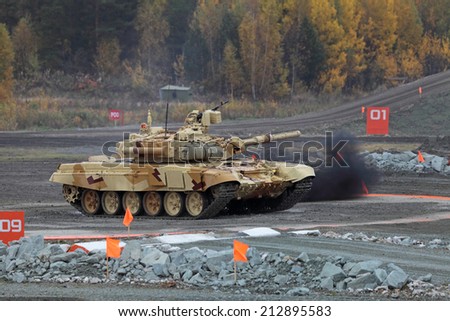 NIZHNY TAGIL, RUSSIA - SEP 27, 2013: The international exhibition of armament, military equipment and ammunition RUSSIA ARMS EXPO (RAE-2013). The T-72 is a Soviet second-generation main battle tank