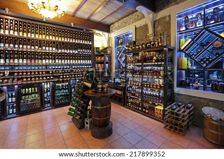 YALTA, REPUBLIC OF CRIMEA, RUSSIA - AUG 14, 2014: Interior and assortment drinks wine shop with traditional Crimean wines, nobody