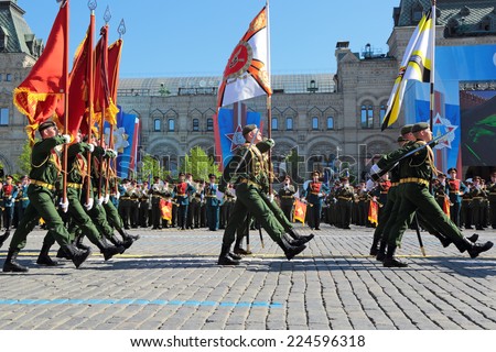 MOSCOW, RUSSIA - MAY 09, 2014: Celebration of the Victory Day (WWII). Mobile brigade of radiation, chemical and biological protection and regiment intelligence explosions