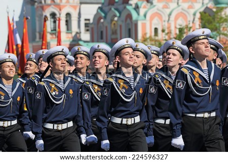 MOSCOW, RUSSIA - MAY 09, 2014: Celebration of the 69th anniversary of the Victory Day (WWII). Solemn marching of soldiers in Red Square. The cadets of the St. Petersburg Sea Cadet Corps