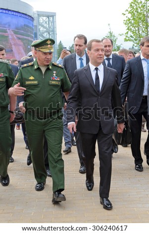 KUBINKA, RUSSIA - JUN 19, 2015: The Minister of Defense Sergey Shoygu and Prime Minister of Russia Dmitry Medvedev at the International military-technical forum ARMY-2015 in military-Patriotic park