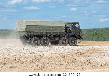 MILITARY GROUND ALABINO, MOSCOW OBLAST, RUSSIA - JUN 18, 2015: The demonstration of the capabilities of a military truck KamAZ-6560 at the International military-technical forum ARMY-2015