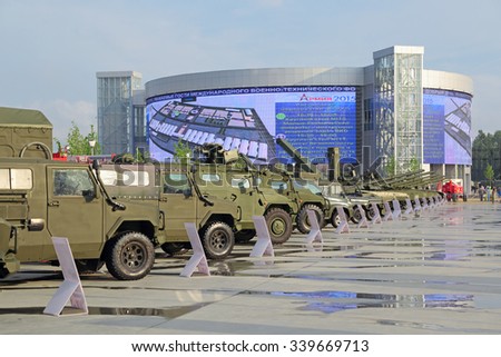 KUBINKA, MOSCOW OBLAST, RUSSIA - JUN 15, 2015: International military-technical forum ARMY-2015 in military-Patriotic park. Visitors view the exhibited military vehicles