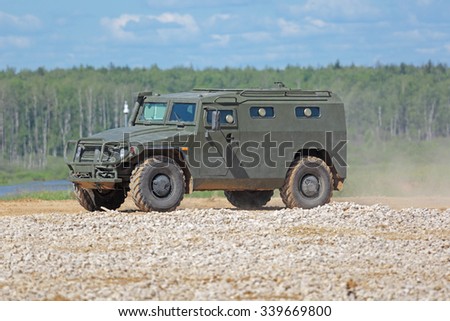 MILITARY GROUND ALABINO, RUSSIA - JUN 18, 2015: The demonstration of the capabilities of a all-terrain infantry mobility vehicle GAZ Tigr at the International military-technical forum ARMY-2015