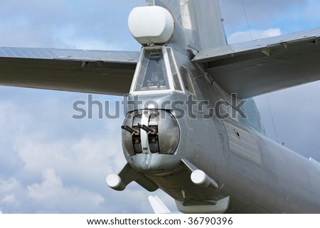 The machine gun located in a tail part of the big plane